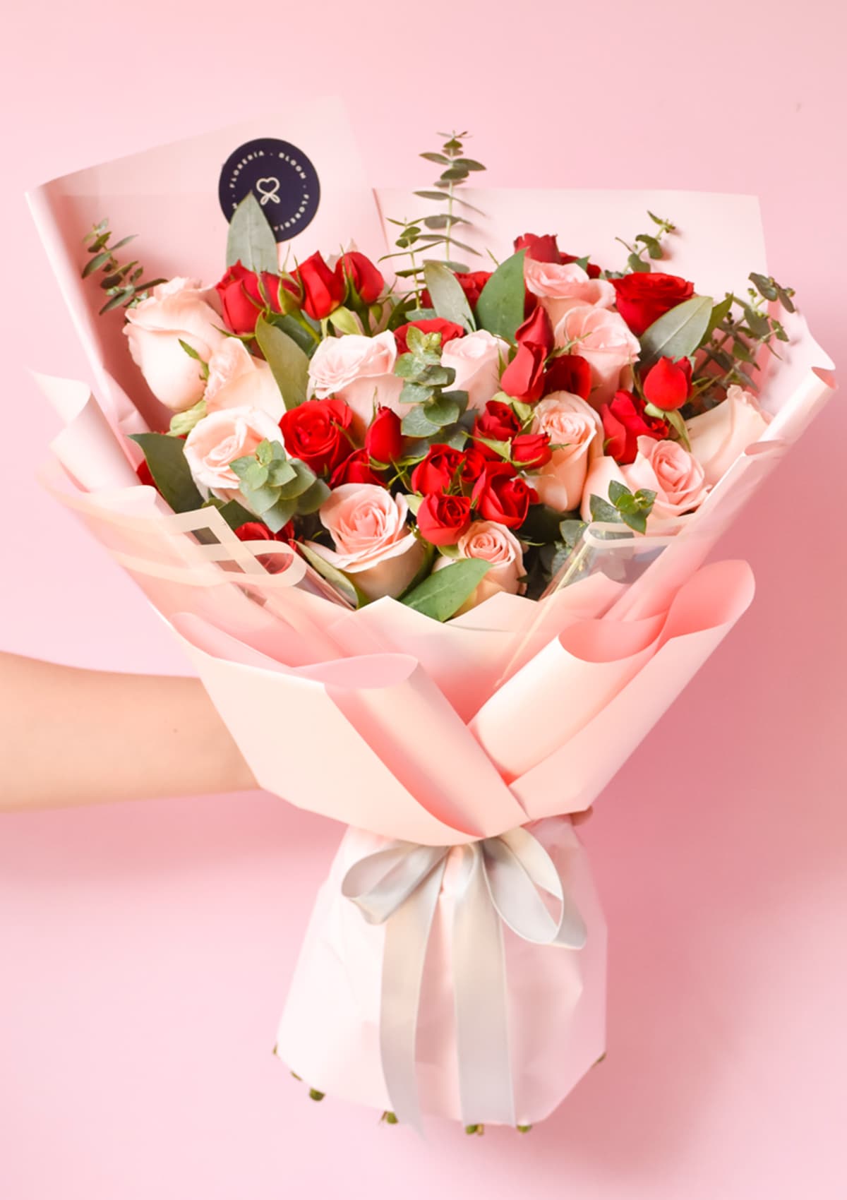 Ramo Sienna de rosas rojas y rosadas — flores para aniversario Lima | Florería Bloom